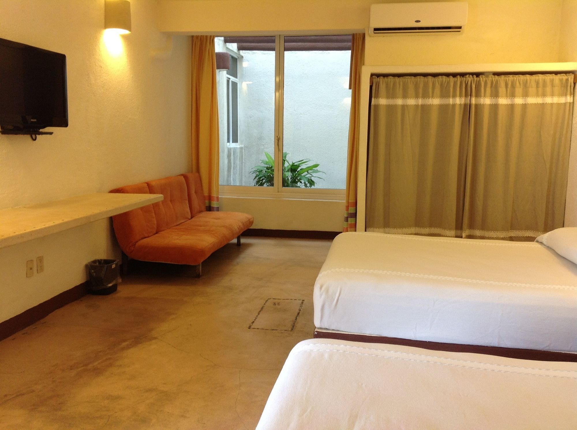 Hotel Plaza Tangolunda Екстериор снимка
